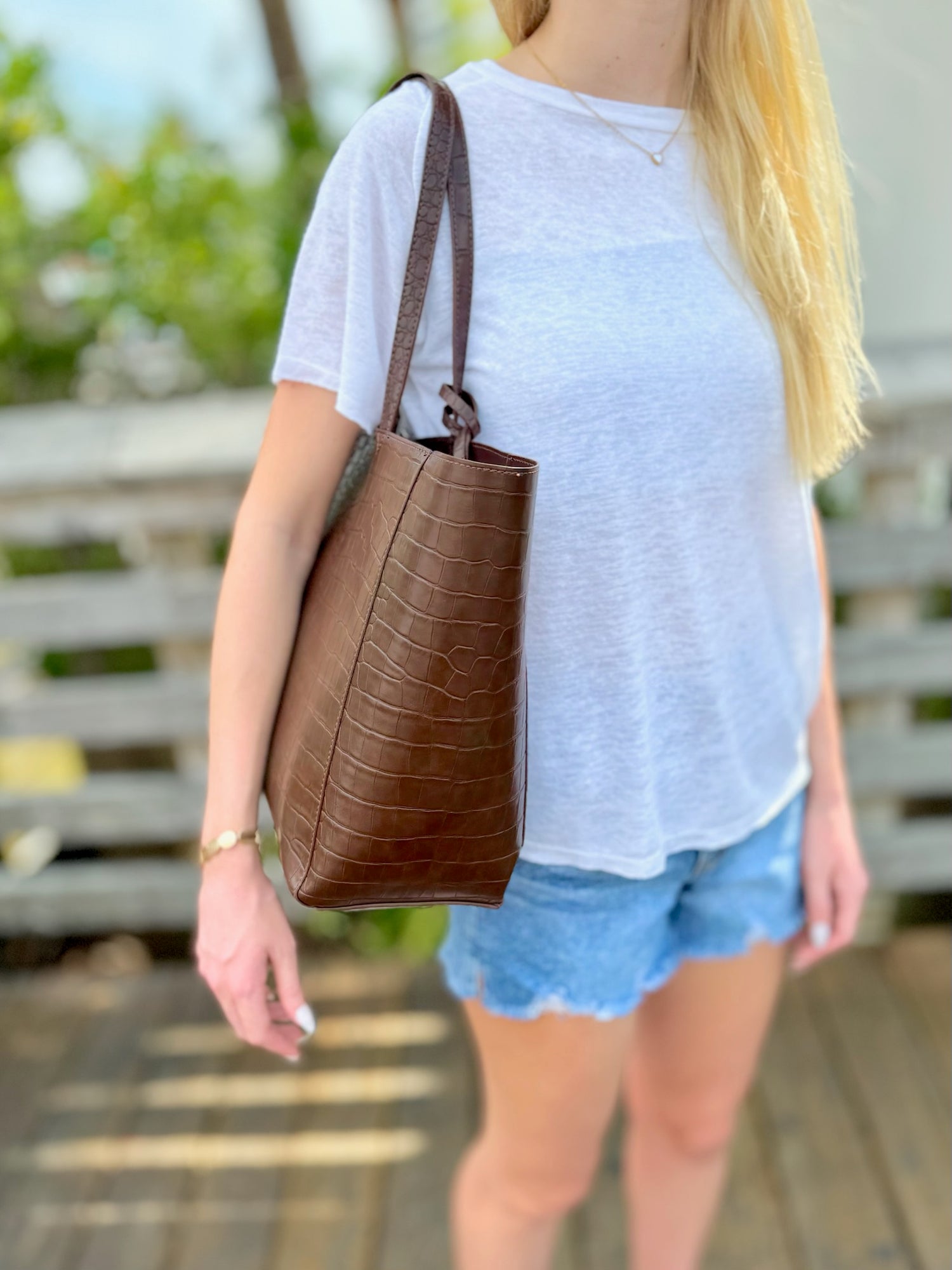 Calista tote in chocolate being worn