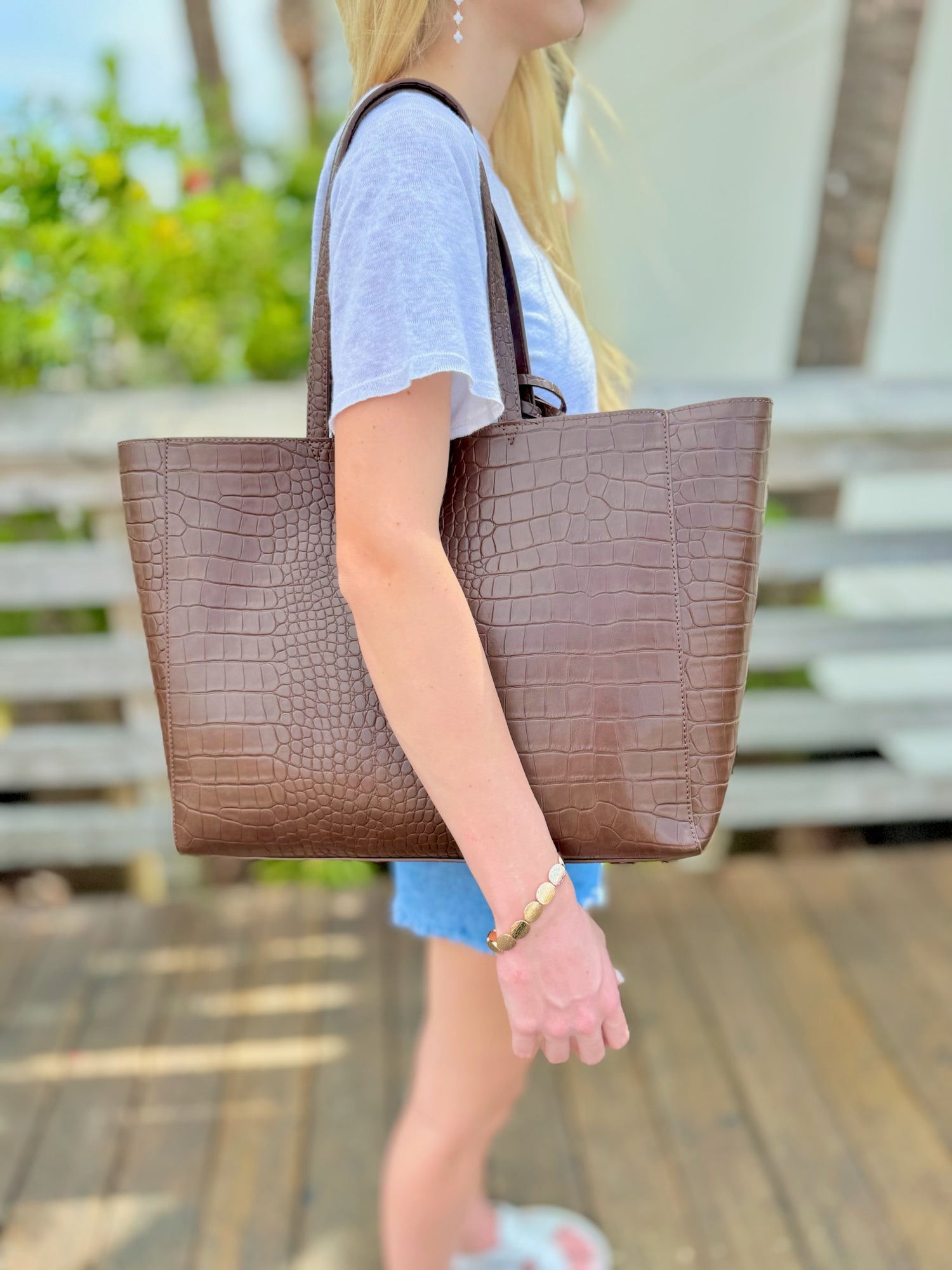 Calista tote in chocolate being worn