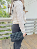 Korinne crossbody in black being worn