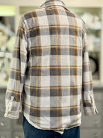 Plaid shirt with a blurred background