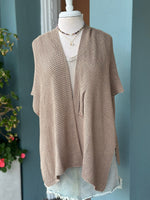 Elise wrap in color warm sand shown paired with gold and tourmaline jewelry 