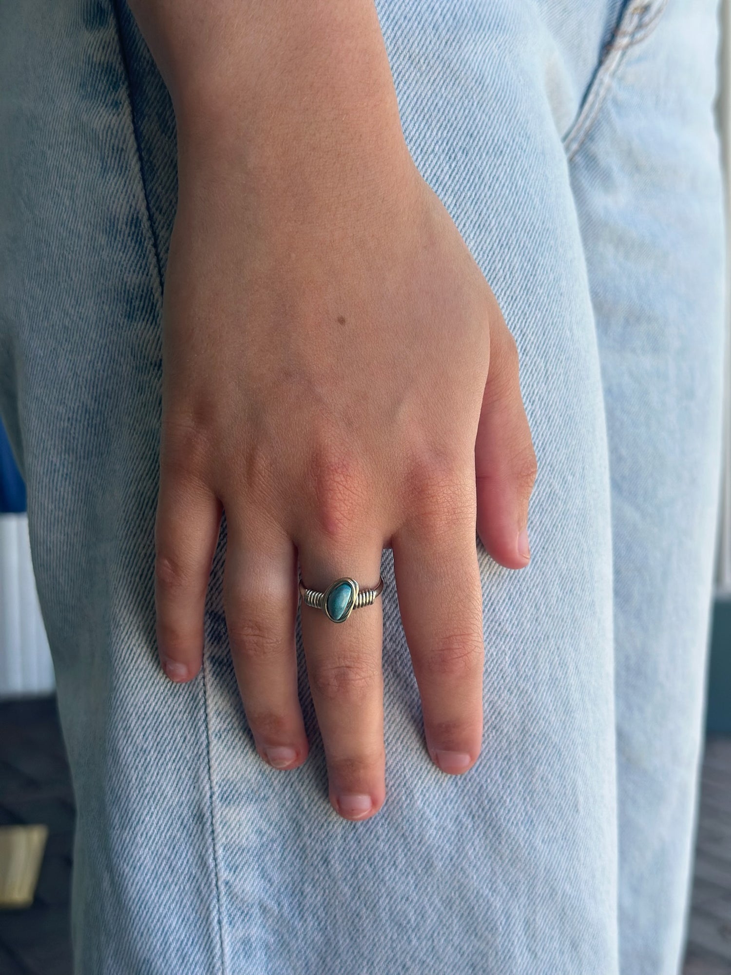 woman wearing turquoise agate ring