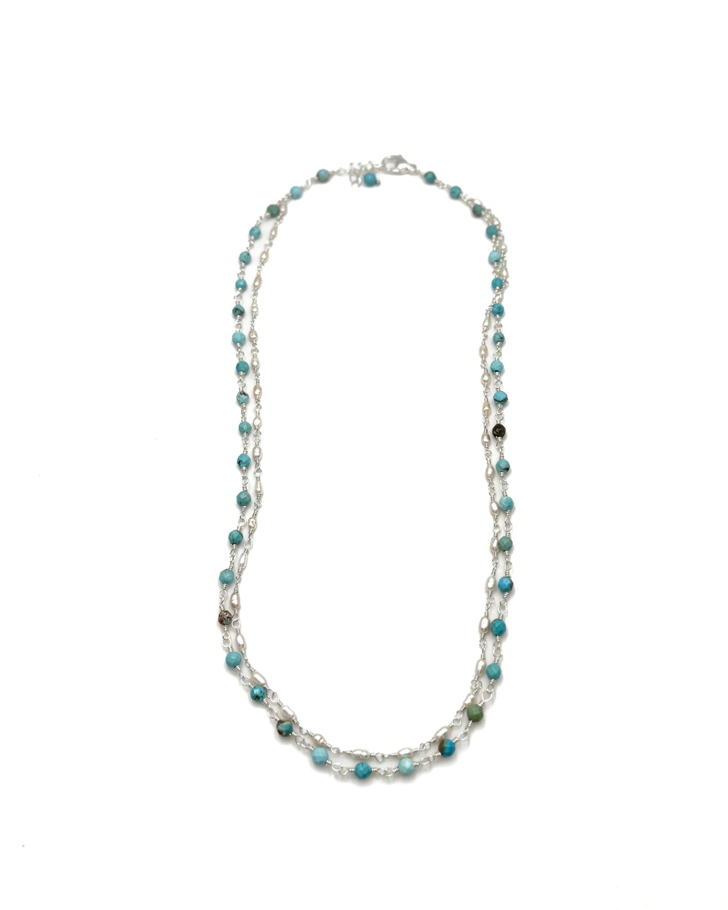 turquoise beaded necklace on a white background