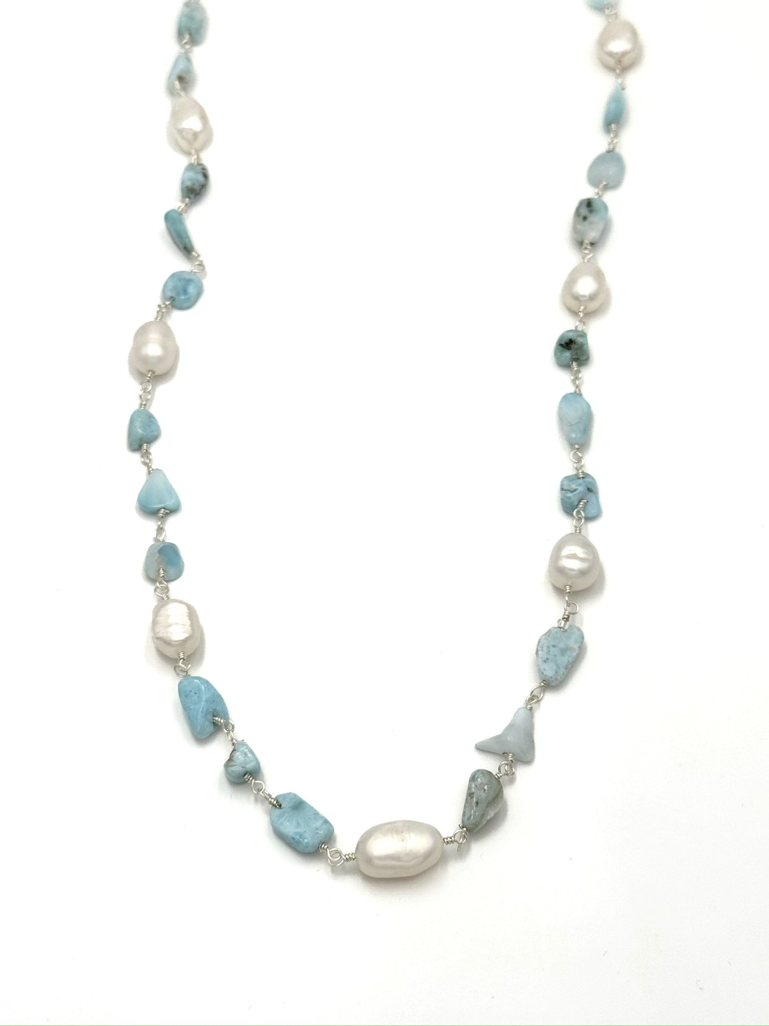 Adrina Amazonite and Freshwater Pearls sterling silver necklace laid out on a white background showing the natural shapes of each stone and pearl.