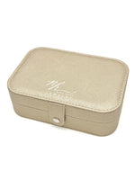 Closed gold Elizabeth Jewelry Case with Nina Halls Jewelry logo, shown on a clean white background.