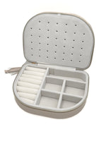 Open Victoria Curved Jewelry Case showing ring rolls, divided compartments, and a soft interior for organized jewelry storage.