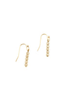 Cora Earrings with faceted neutral beads on gold hooks at Ardor Boutique.