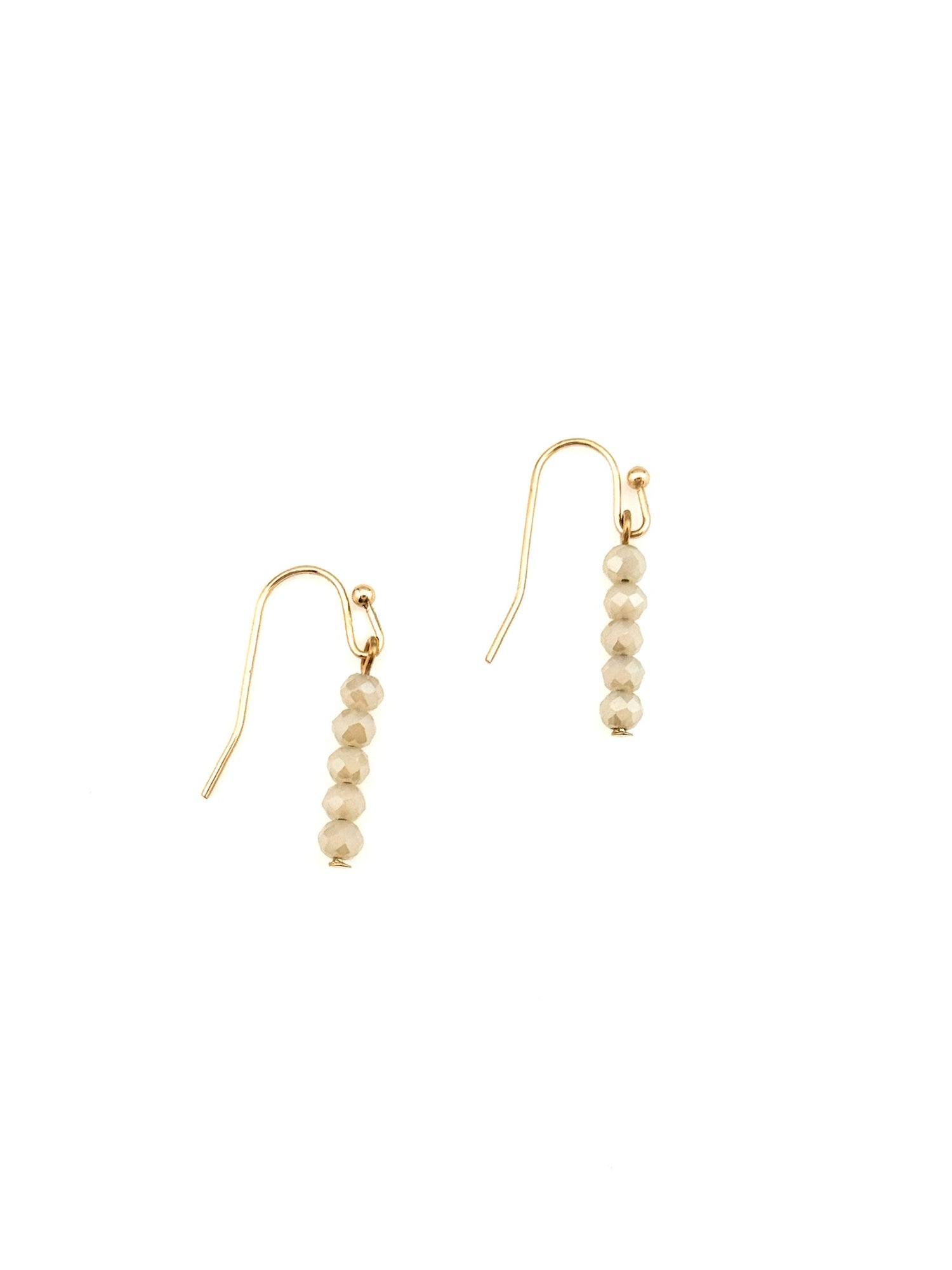Cora Earrings with faceted neutral beads on gold hooks at Ardor Boutique.