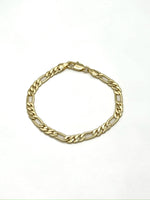 Ella Gold Chain Bracelet with flat polished gold-tone links arranged in a circle on a white background