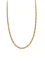Gold chain necklace on a white background