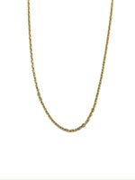 Gold chain necklace on a white background