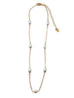 Paislee Pearl Necklace featuring delicate spaced pearls on a gold-tone chain