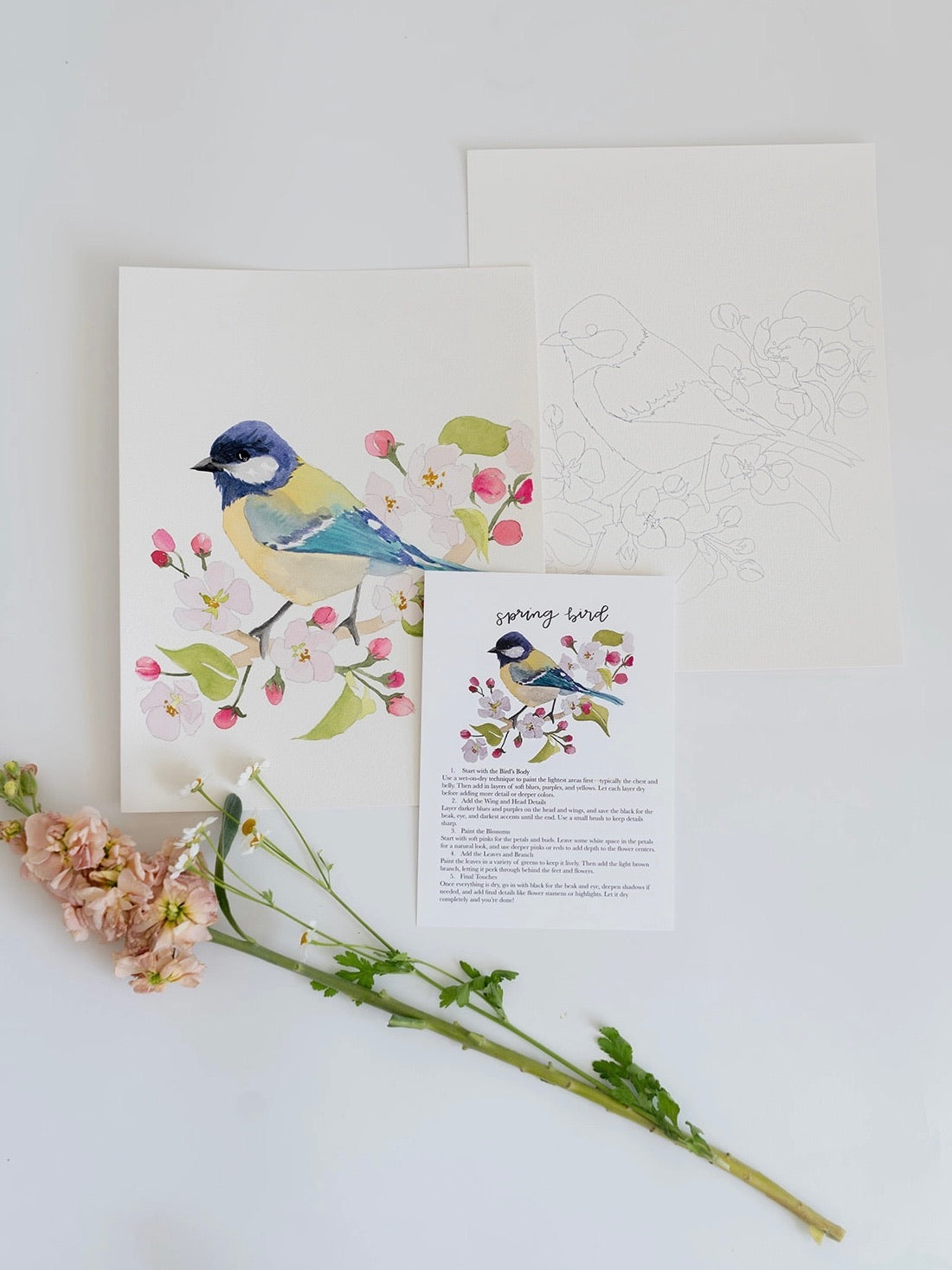 Greeting card with bird illustration and envelope on a white background