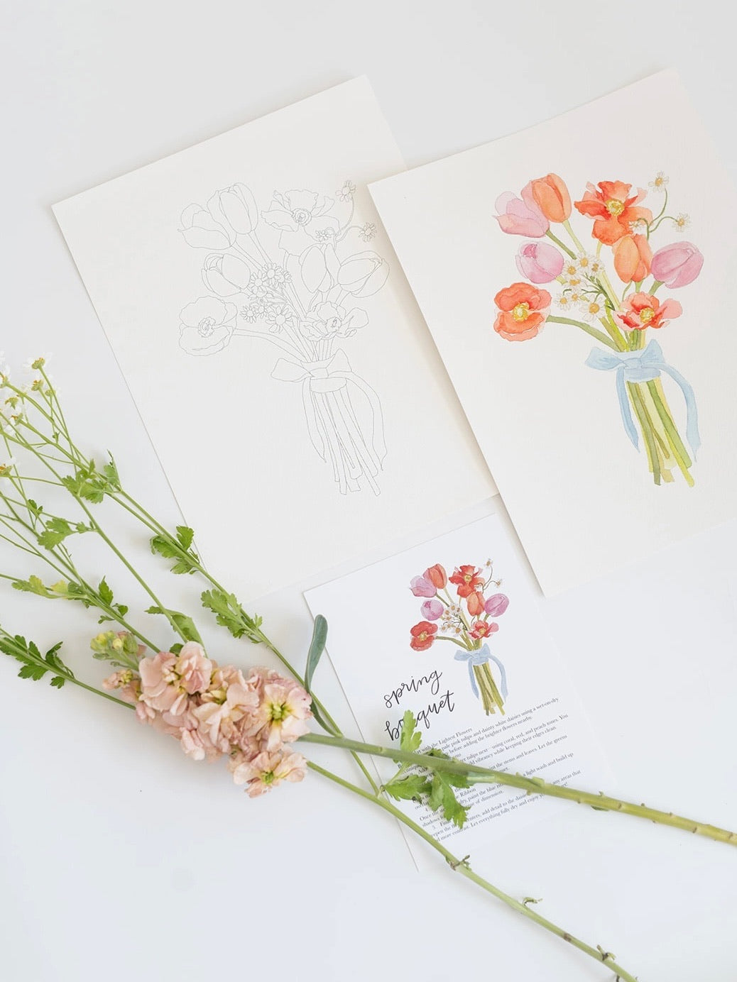 Floral card with a bouquet of flowers and greenery on a white background