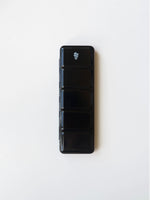 Black paint case with a logo on a white background