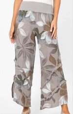 Front view of the Catherine Linen Pants in mocha floral showing the wide leg, tiered frayed seams, and soft knit waistband.