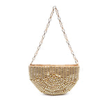 Gold beaded handbag with chain strap on a white background