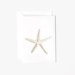 Mini notecard with watercolor starfish illustration on white cardstock, paired with a matching envelope.