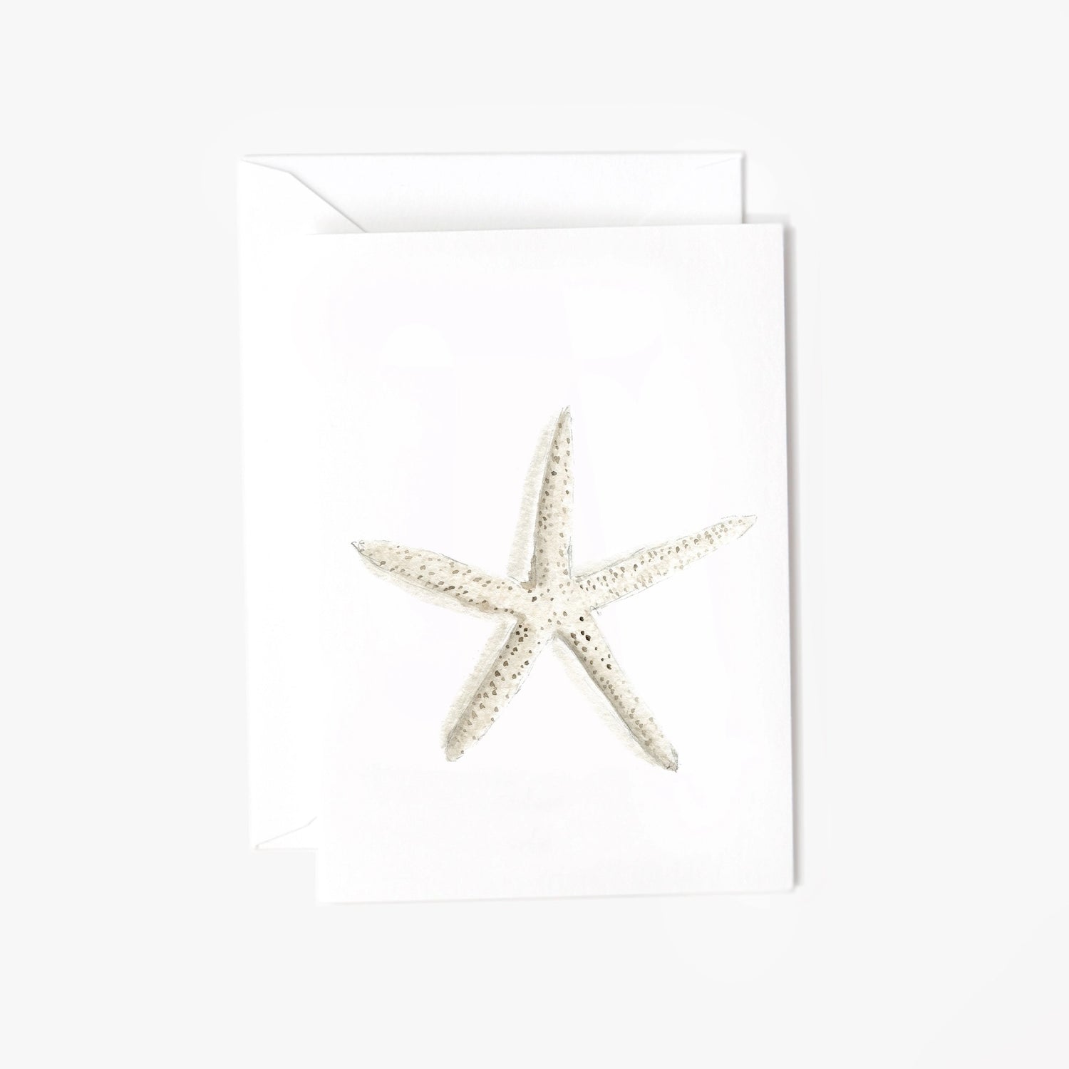 Mini notecard with watercolor starfish illustration on white cardstock, paired with a matching envelope.