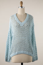 Soft aqua blue open knit sweater with a V-neckline, long sleeves and relaxed fit at Ardor Boutique.