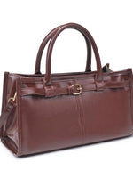 Brown leather handbag with a strap on a white background