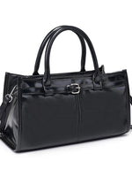 Black handbag with a buckle on a white background