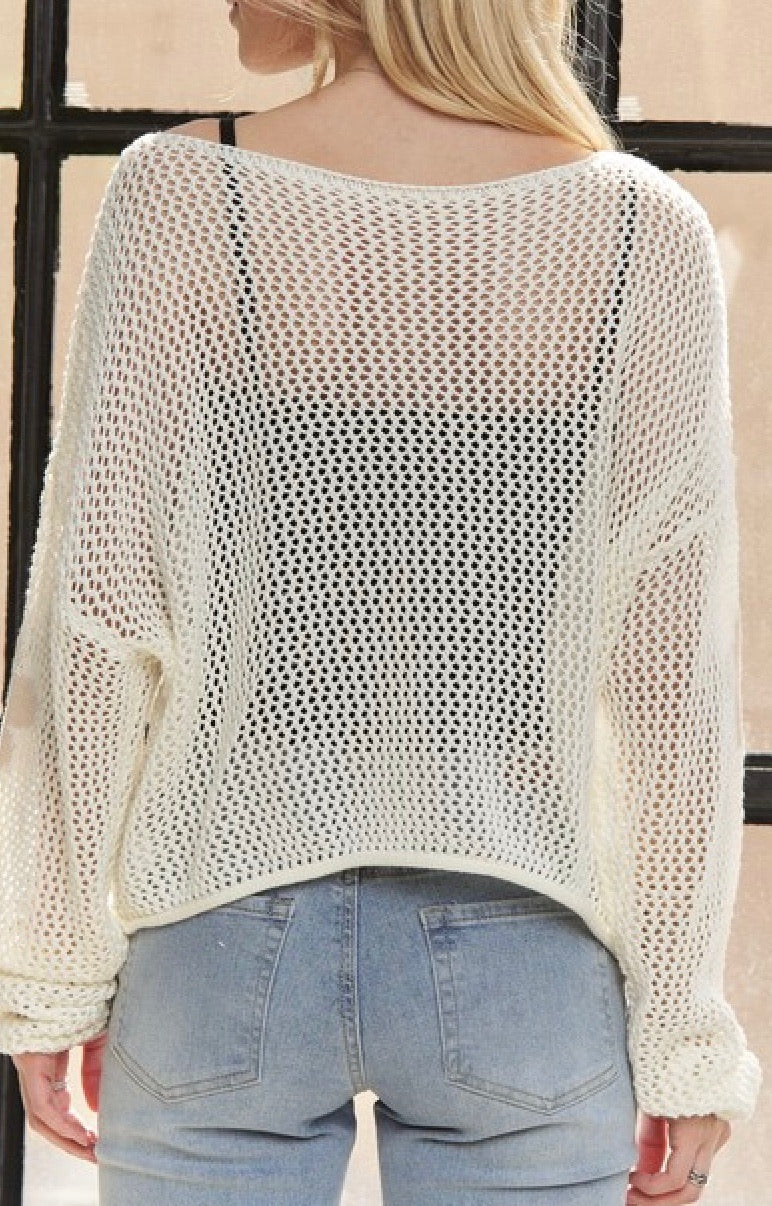 back of ivory flower crochet sweater