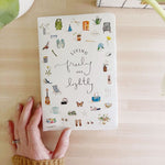 Cover of the Living Freely and Lightly Journal featuring watercolor illustrations of everyday items and handwritten script title.”