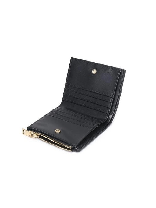 Black wallet with gold accents on a white background