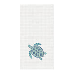 Towel with a turtle design on a white background