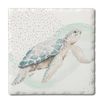 Square ceramic coaster featuring a watercolor sea turtle with soft ocean waves and dotted background.