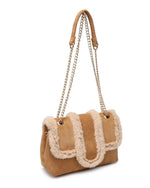 Tan handbag with fur trim and chain strap on a white background (front view)