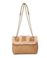 Tan handbag with fur trim and chain strap on a white background (back view)