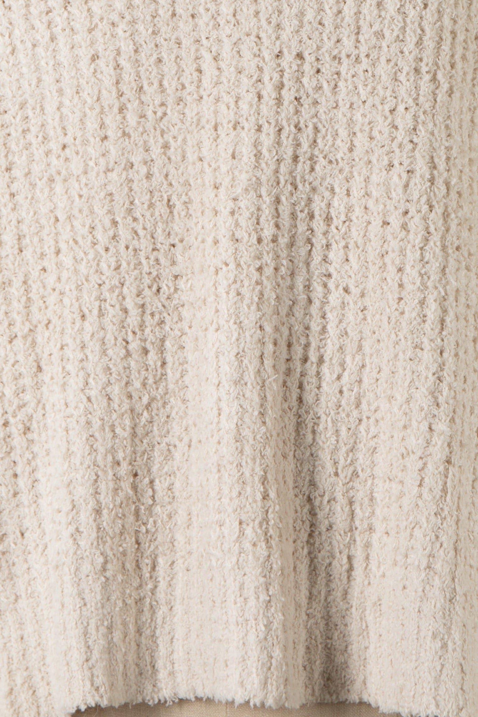 Close-up of a textured beige fabric