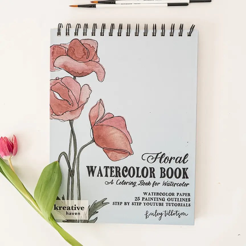 Floral watercolor book with pink flowers on a white background