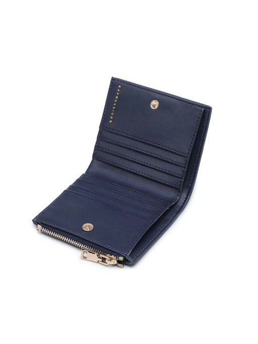 Navy blue wallet with gold accents on a white background