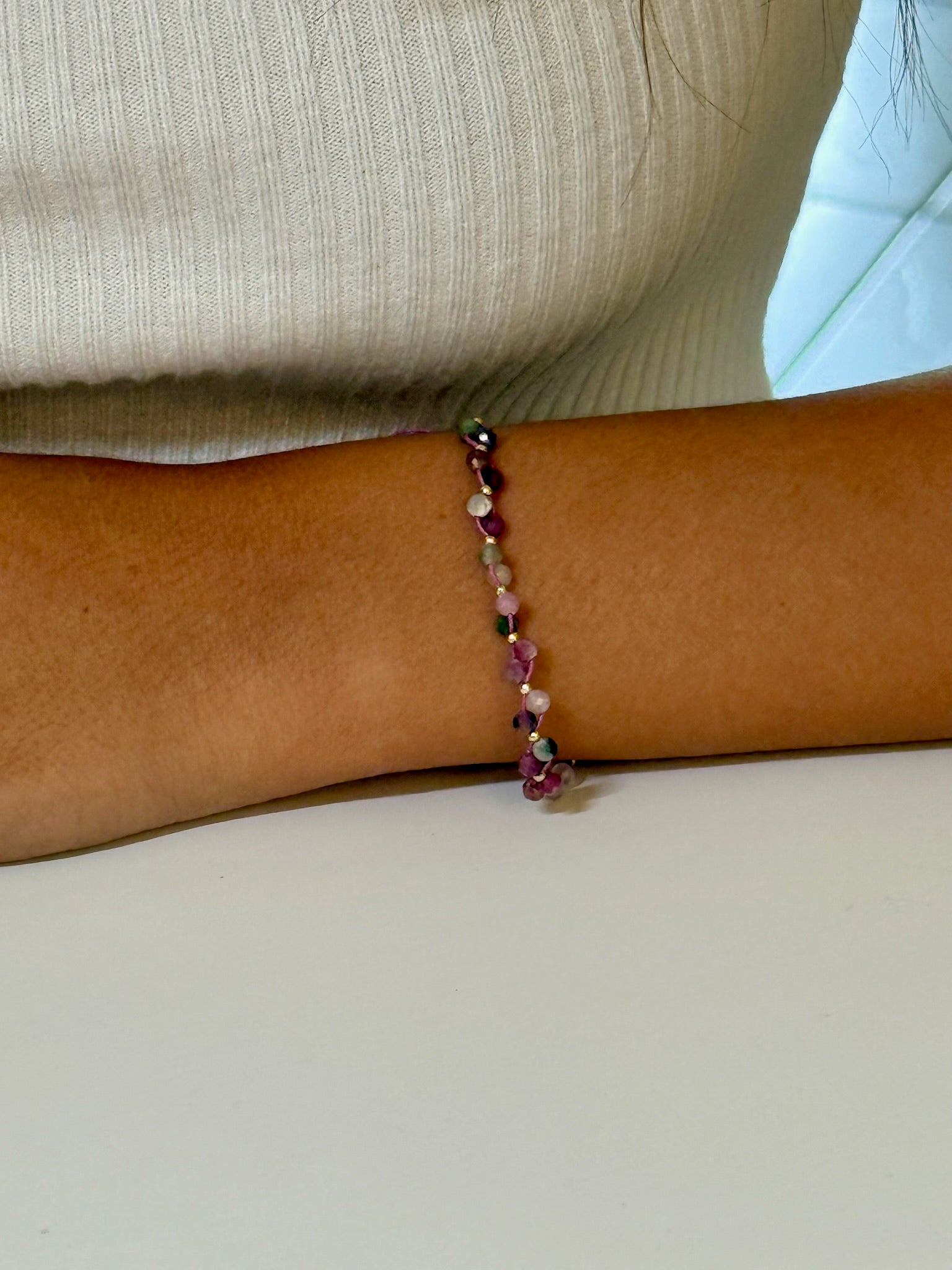 Purple multicolor tourmaline bracelet being worn