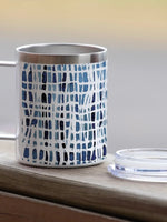 Indigo blue patterned stainless steel 12oz mug on wood surface