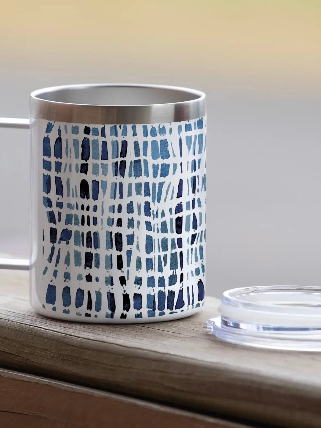Indigo blue patterned stainless steel 12oz mug on wood surface