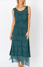 Model wearing the Briella Layered Silk Dress in peacock green, made in Italy with flowing washable silk layers.