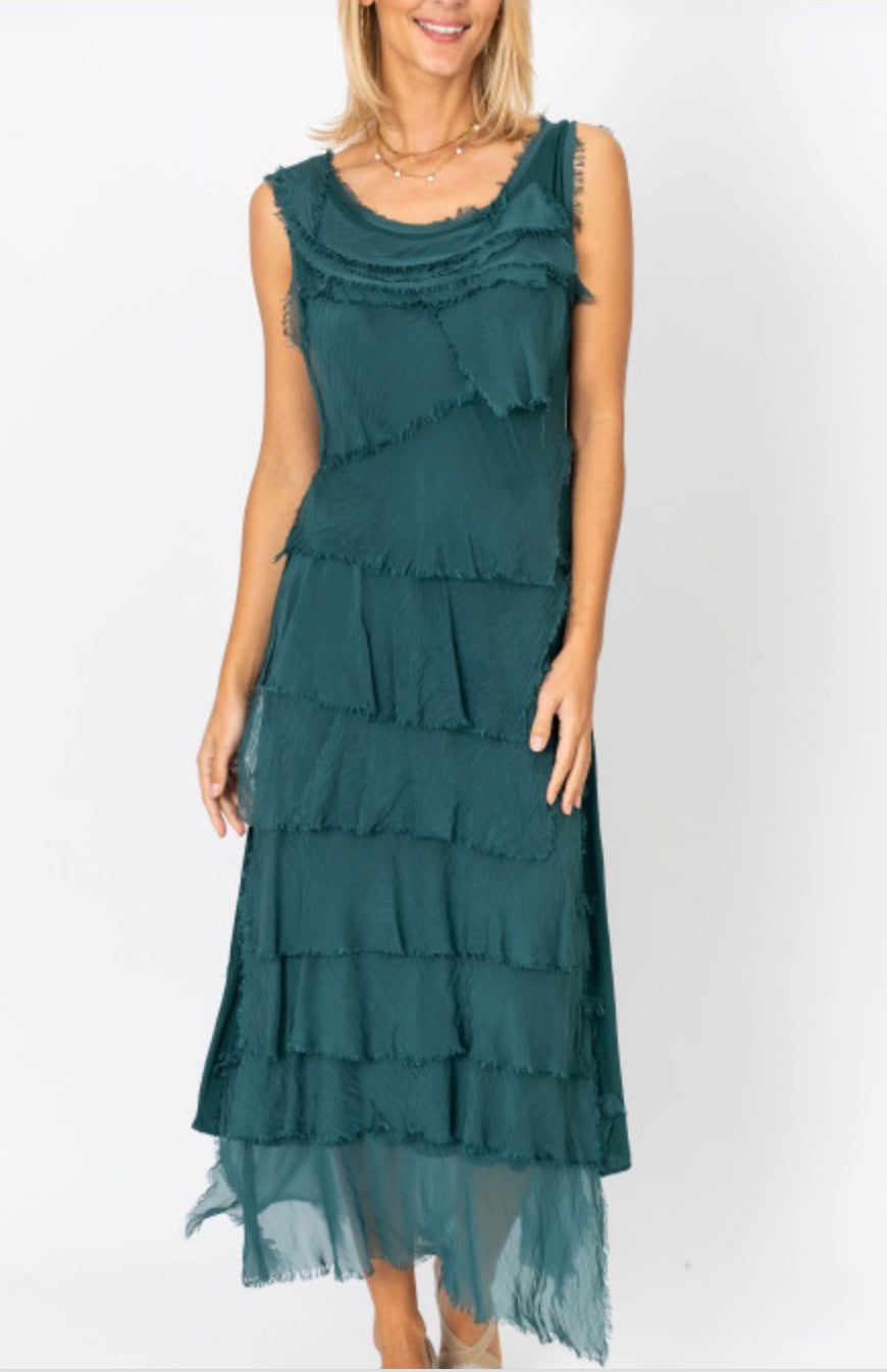 Model wearing the Briella Layered Silk Dress in peacock green, made in Italy with flowing washable silk layers.