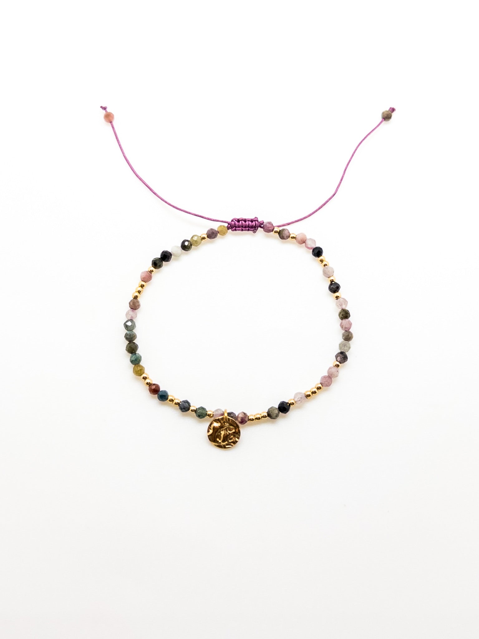 Ivanna Tourmaline Bracelet in purple with drawstring closure to tighten around wrist