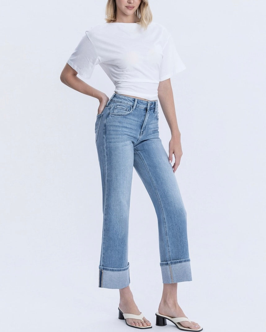 side view of medium light wash cuffed slim wide jeans from Ardor Boutique