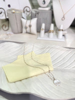 Jewelry Polishing Cloth displayed next to sterling necklace