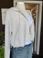 Kennedy Hoodie in Ivory side view on mannequin. Shows hoodie zipped up