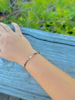 Lila Tourmaline & Freshwater Pearl Bracelet shown on model wrist