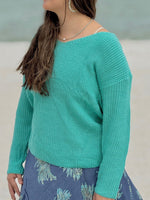 Lily Sweater in Aqua on model styled with aqua beaded jewelry