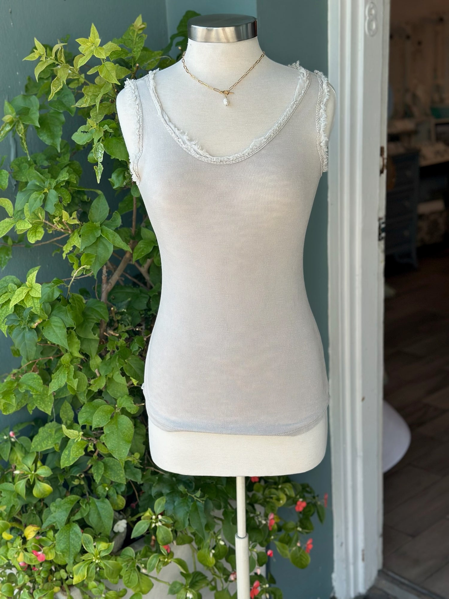 Lor Beige Tank on mannequin. front view
