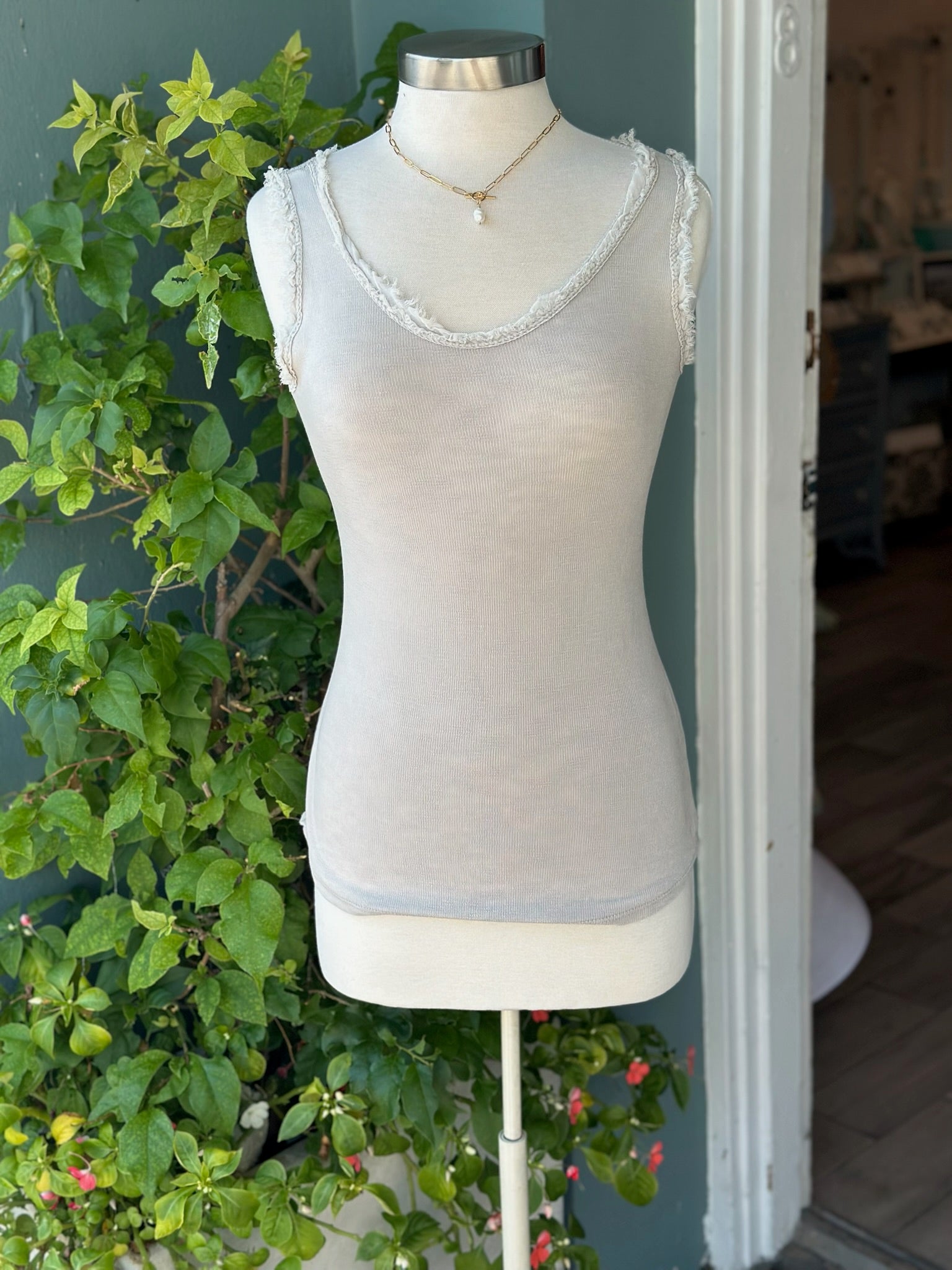 Lor Beige Tank on mannequin. front view