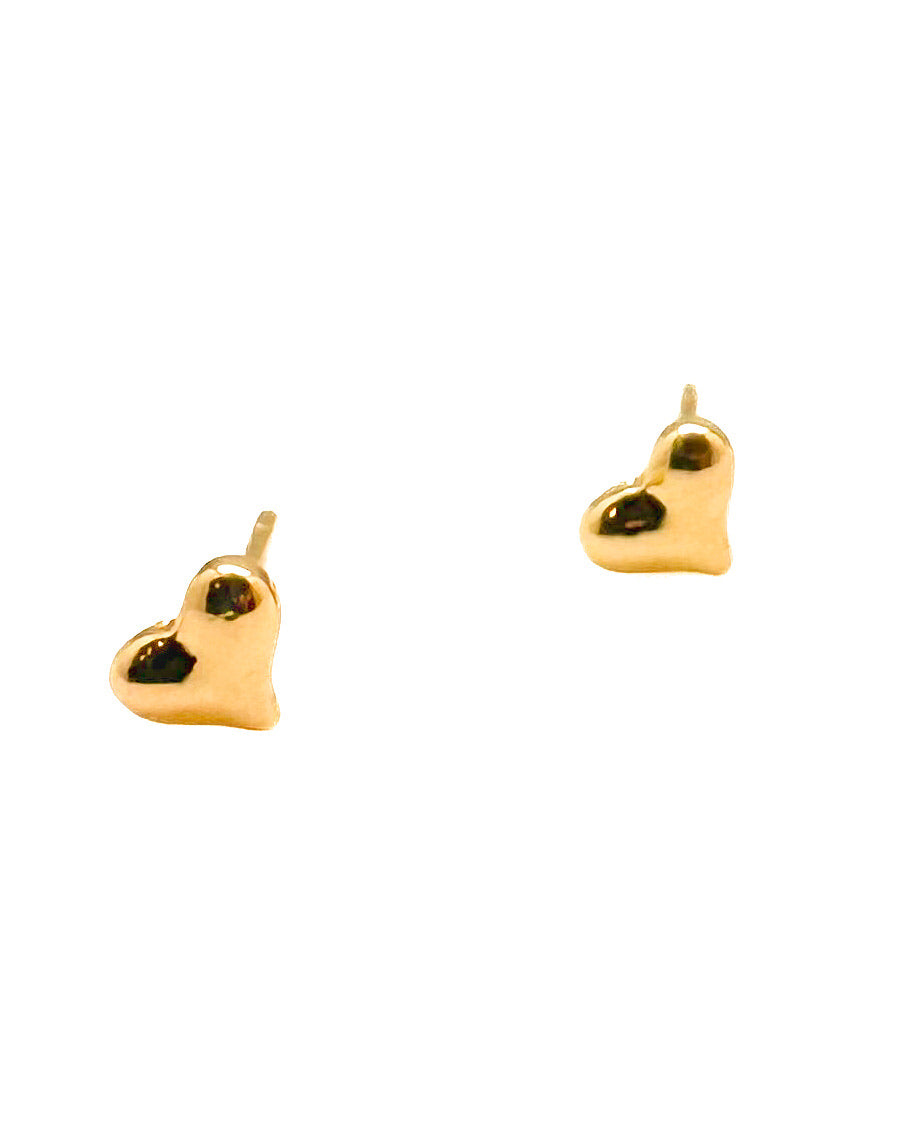 A pair of small gold heart stud earrings on a plain white background.